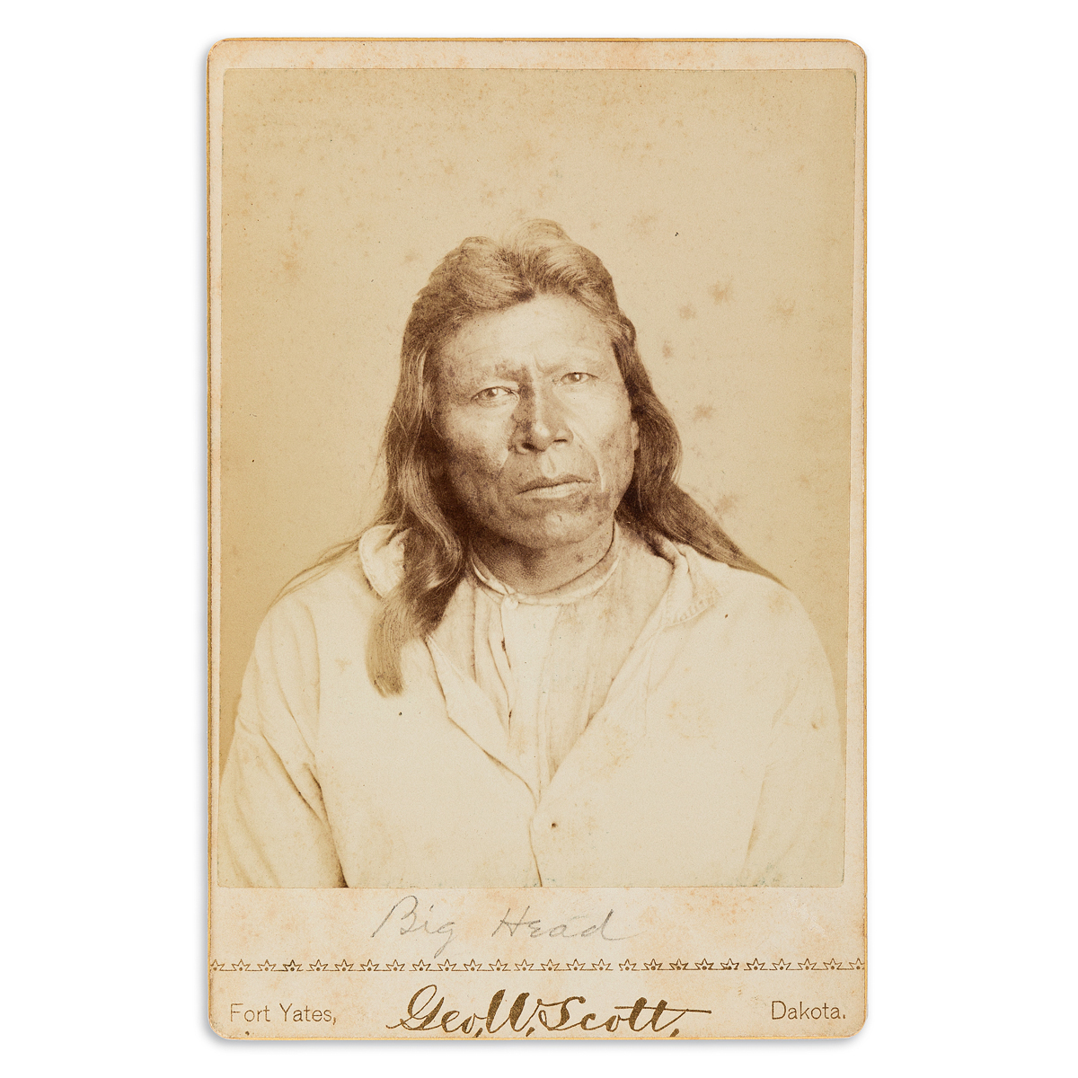 (AMERICAN INDIANS--PHOTOGRAPHS.) George W. Scott. Cabinet card of the Sioux chief Big Head, with Scotts sale letter.